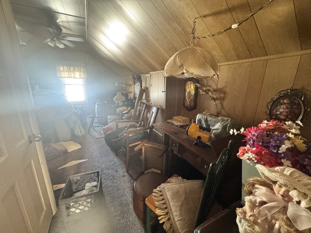 612 Longview Drive cluttered attic room before sale, Lexington Kentucky