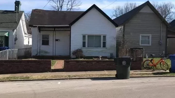 Before: Front exterior of shotgun-style home on MLK Blvd, Lexington KY
