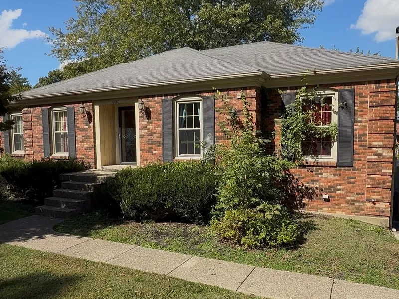 Large red brick inherited house purchased in Louisville