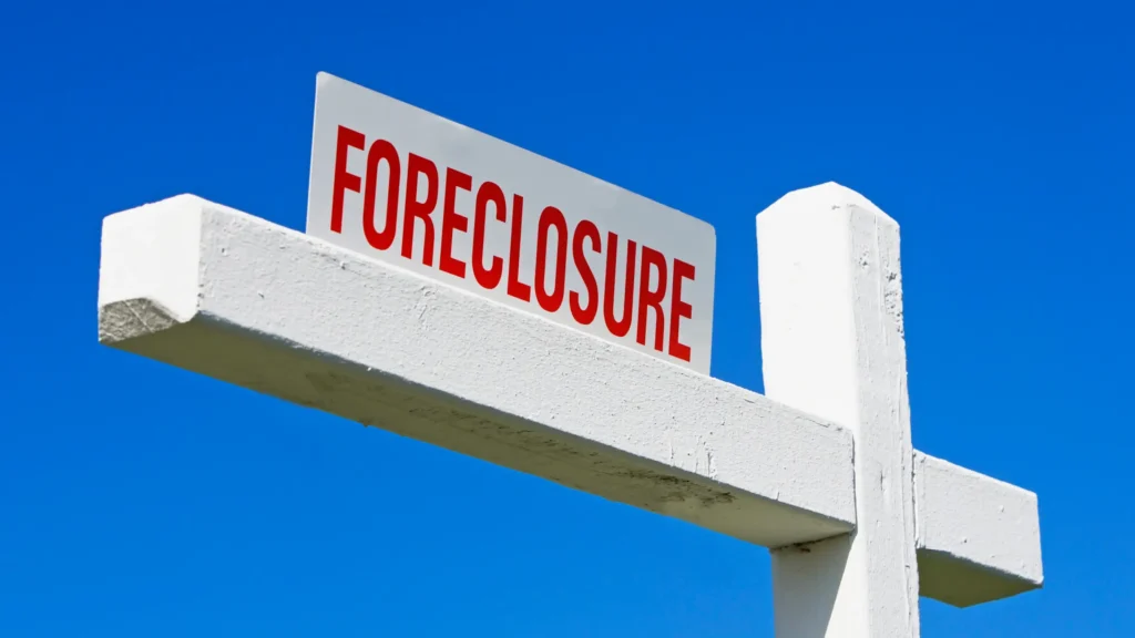 Houston homeowner reviewing a foreclosure notice and calculating home equity, mortgage debt, and possible selling options