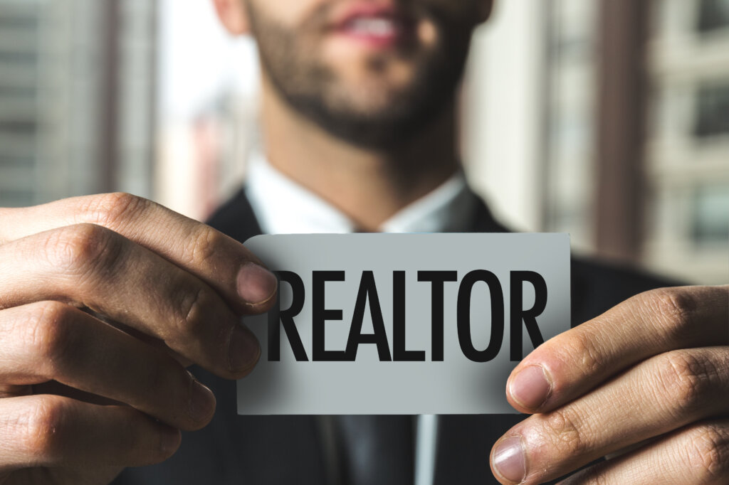 Houston homeowner comparing real estate agents before choosing a selling method