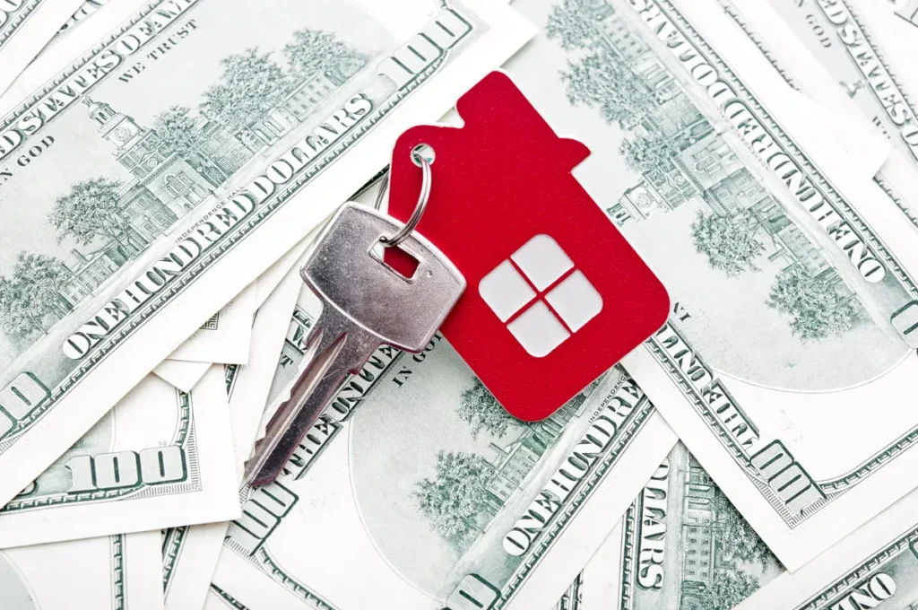Houston homeowner comparing an iBuyer offer with a local cash buyer’s written offer
