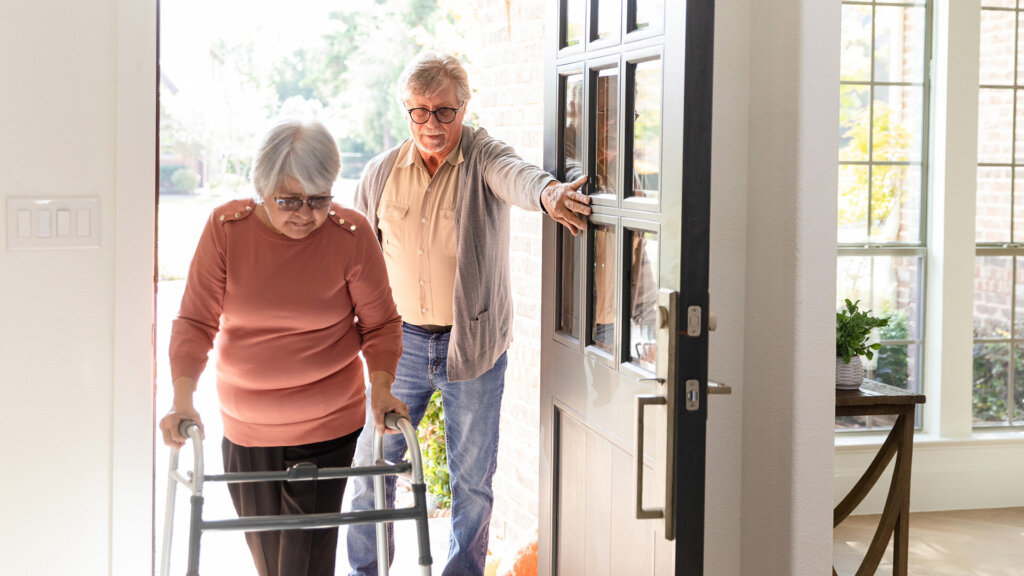 Homeowner reviewing house sale paperwork while planning a move in Texas