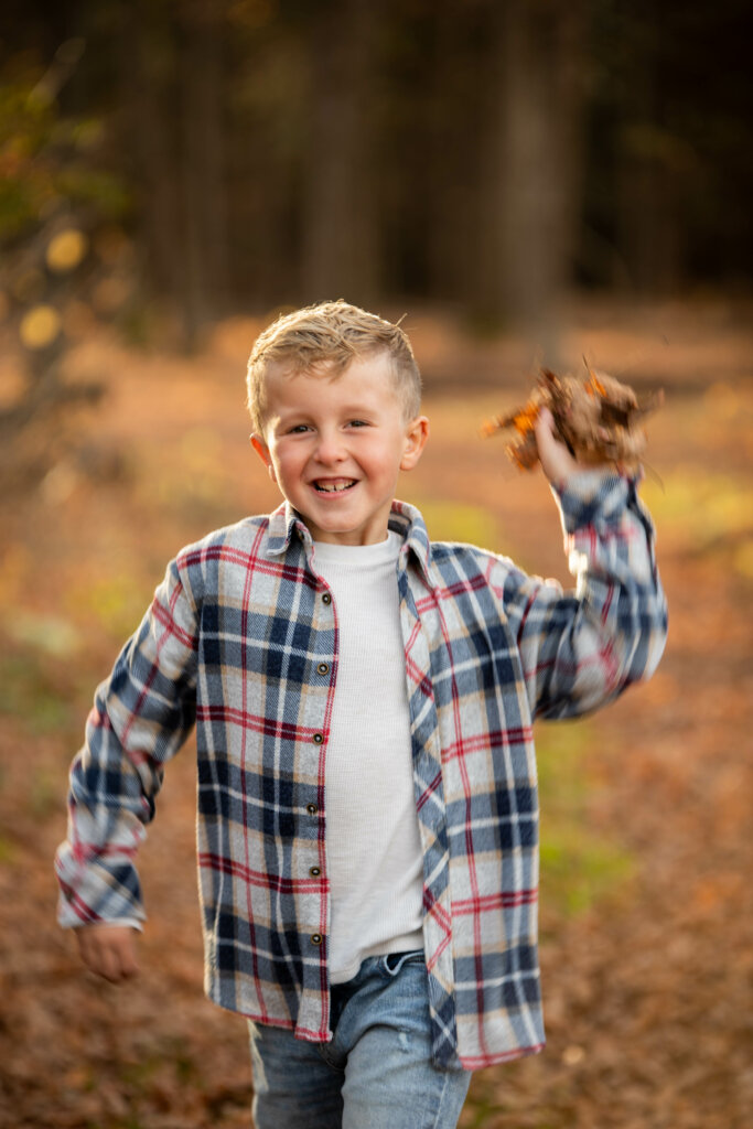 korbin son throwing leaves. media and head of entertainment for wisconsin cash home buying company