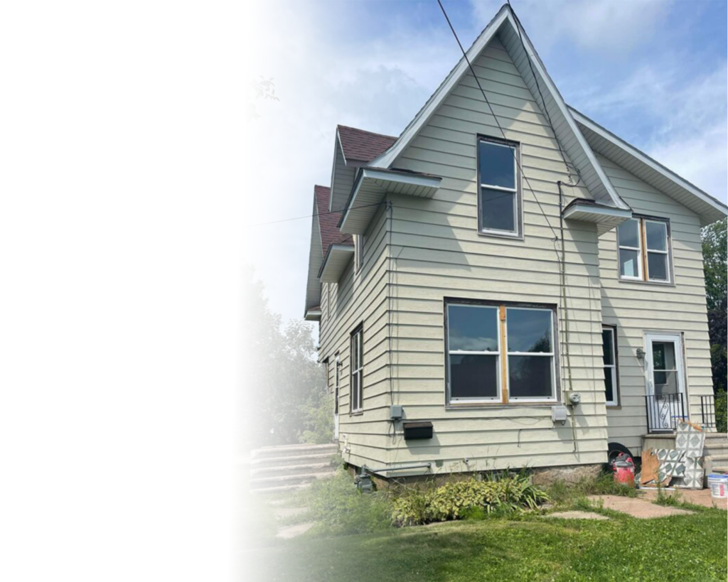 outside picture of house bought for cash in Antigo, WI