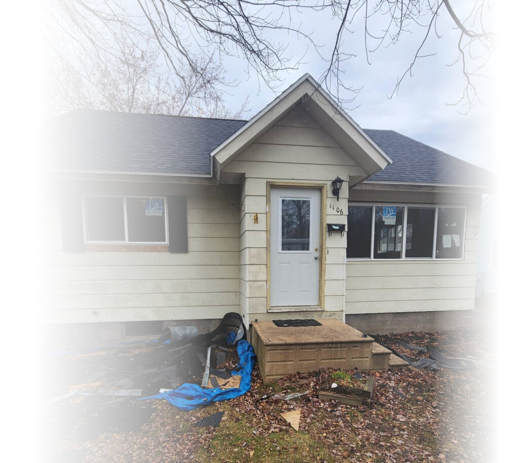 We buy houses fast. house in wausau wisconsin being demoed on the outside.
