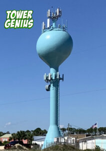 Picture of blue water tank tower with 2 cellular site antennas and Tower Genius logo