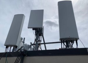 Photo of 3 rooftop AT&T cellular antennas. ATT CELL TOWER LEASE
