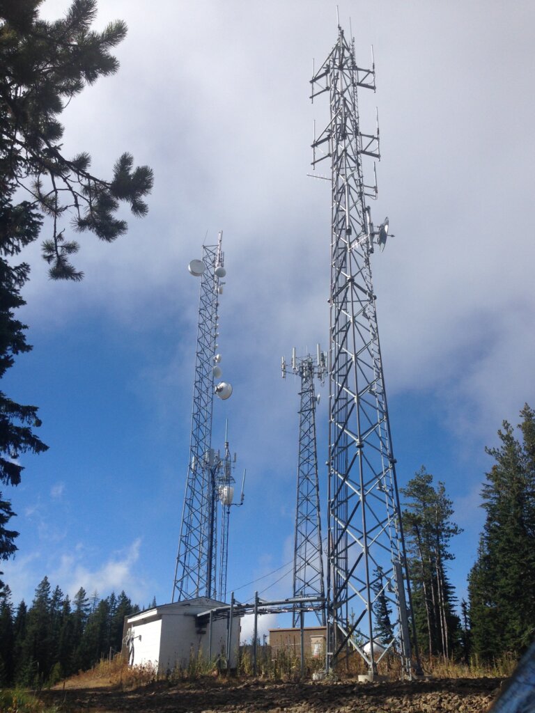 Mountaintop lattice cellular and communications towers in Idaho.