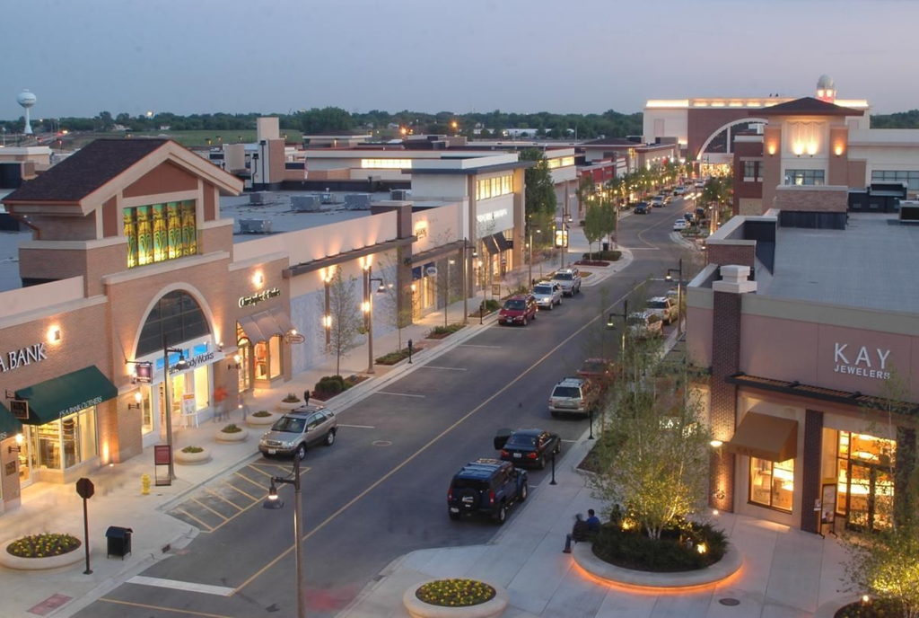 Outdoor image of a shopping center at dusk in Bolingbrook IL