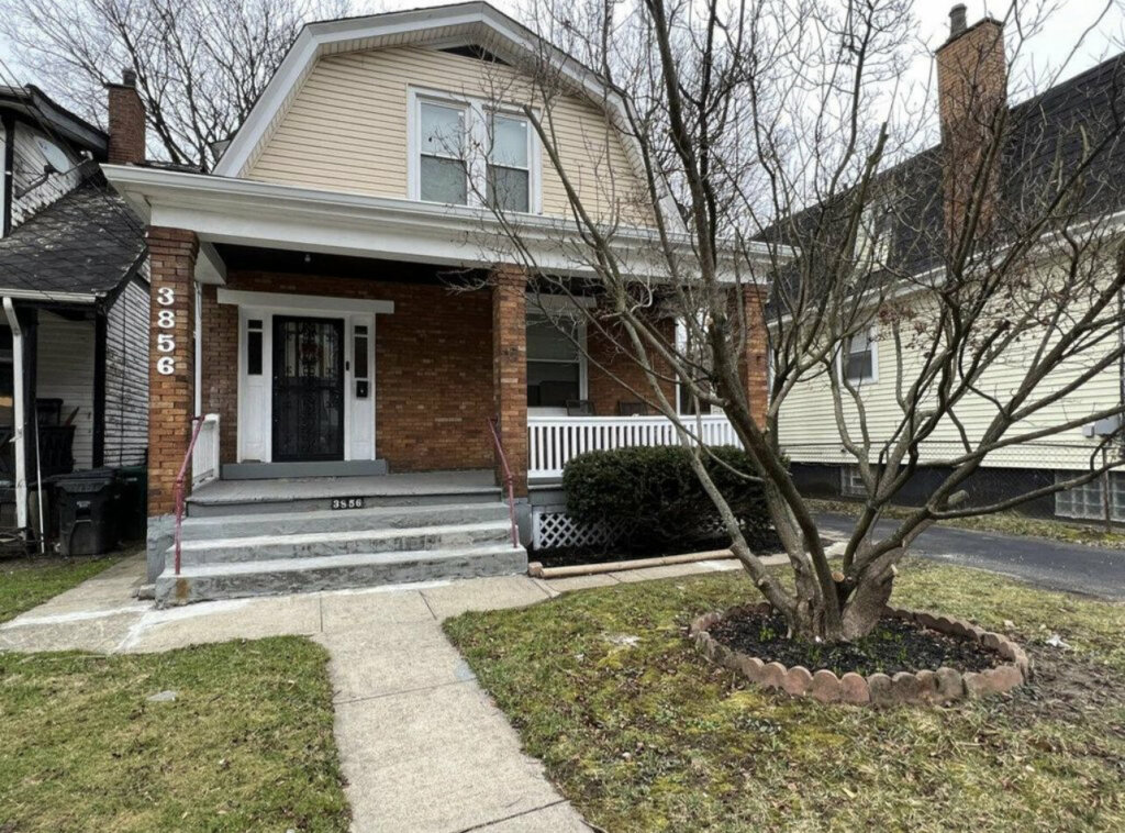 residential property for sale with a brick porch
