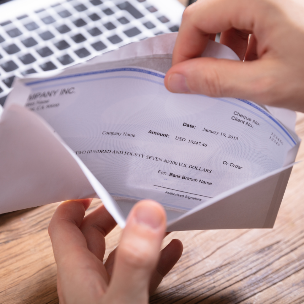 person packing up a check