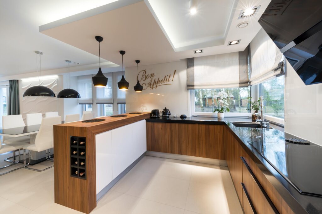 Home-renovations-Winnipeg-kitchen-with-a-wood-countertop-and-black-countertops