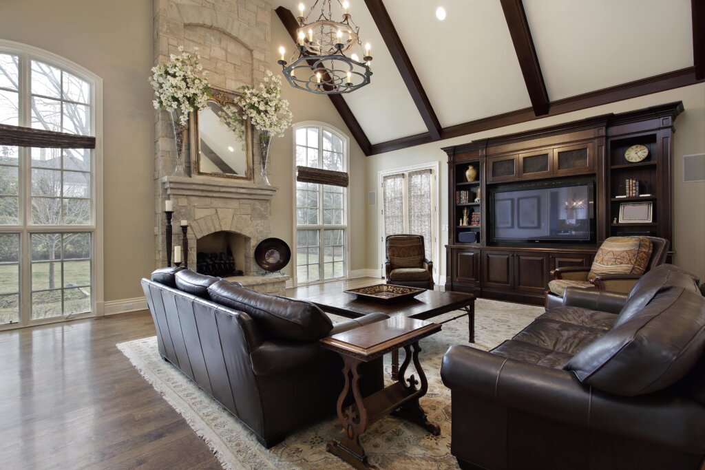 Home renovations Winnipeg living room with a fireplace and leather couches