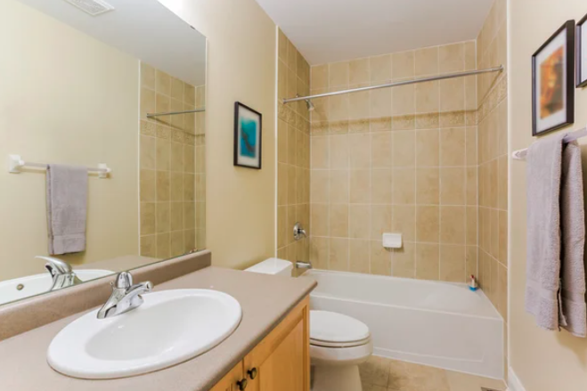 bathroom with a shower sink
plus
mirrors and towel