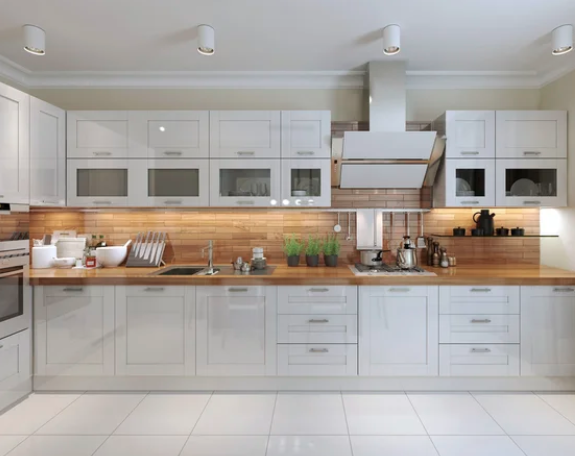 Winnipeg kitchen renovations kitchen with white cabinets and wood counter tops