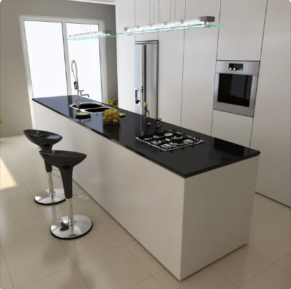 Kitchen renovations in Winnipeg with white cabinets and black counter tops