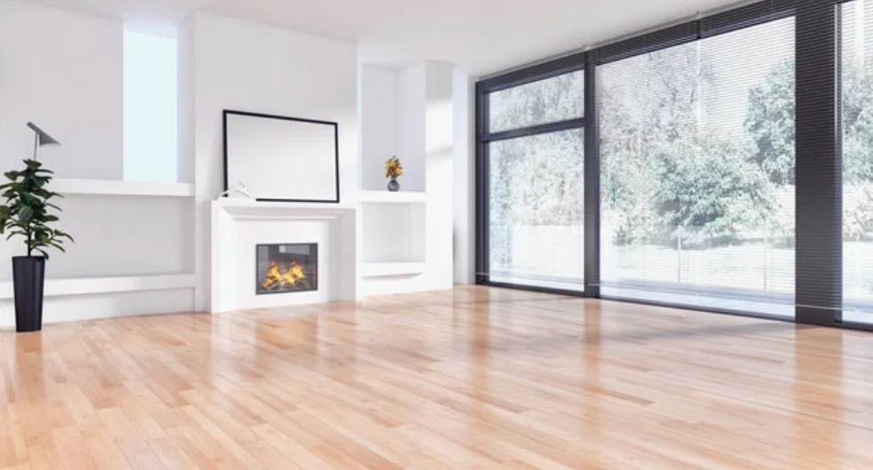Winnipeg flooring renovation room with a fireplace and a wood floor
