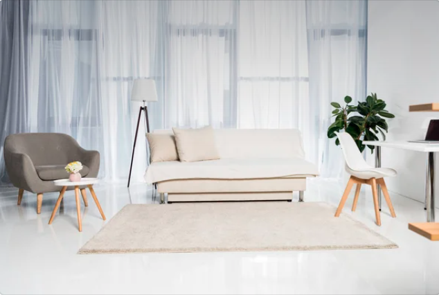 
Winnipeg home renovations room with a couch and chairs,