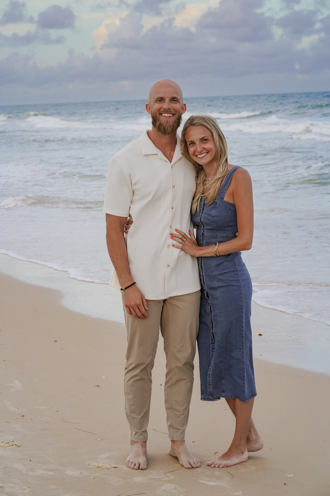 The owner of Revivalist Homes with his wife. A company that buys houses in Bowling Green, KY. 