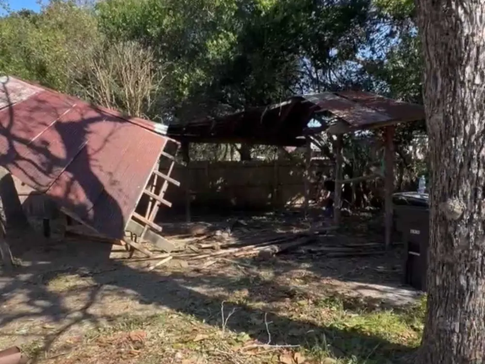 Shed and carport roofs collapsed by Hurricane Isaias winds