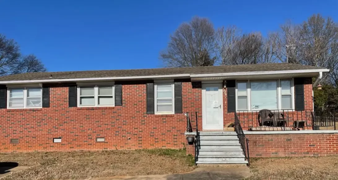 Single-story brick ranch style house in Hendersonville, NC ready for a quick cash sale with Carolinas House Buyers
