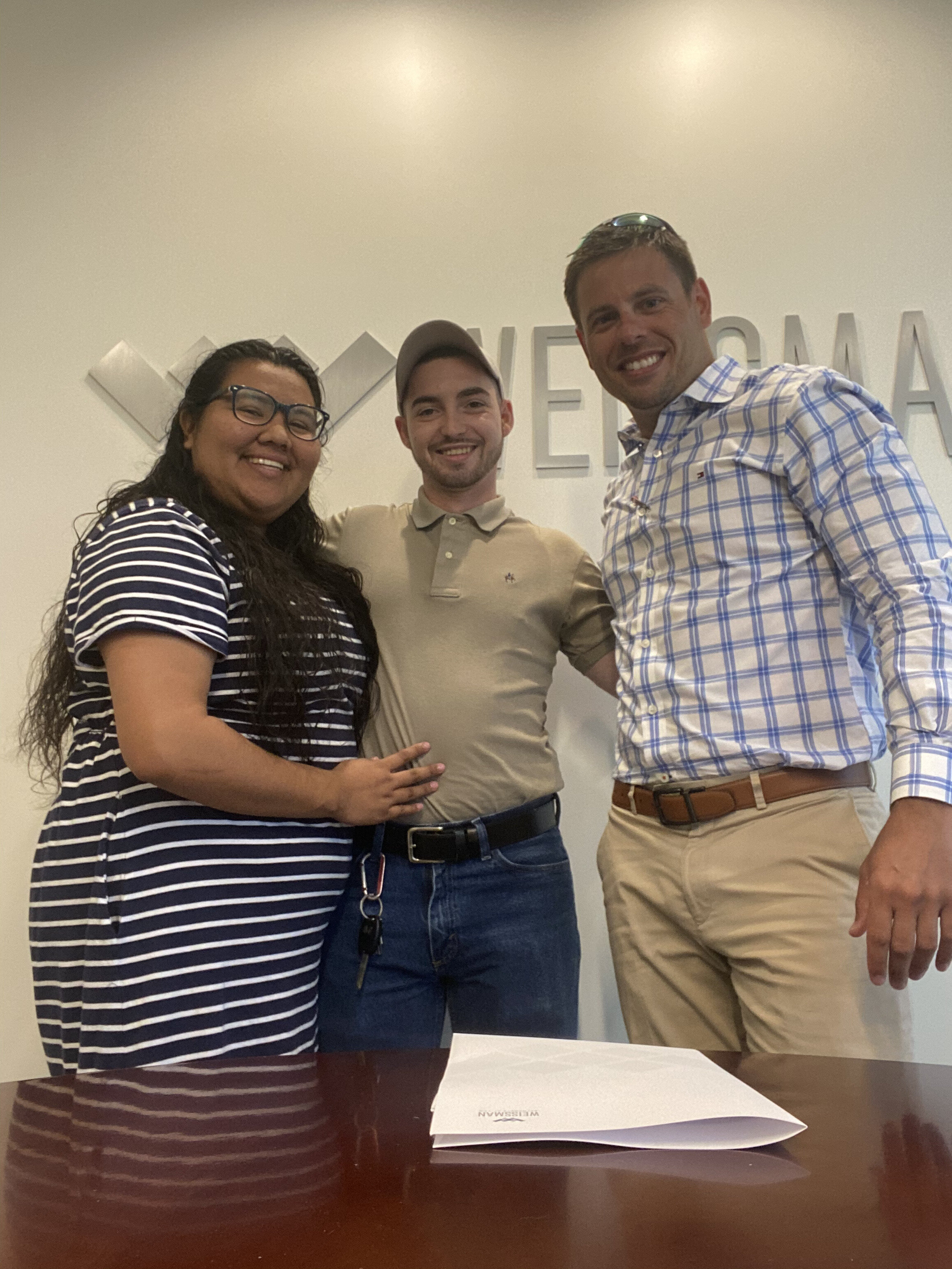 Top realtor Georgia. Coe Cameron local Georgia realtor with clients.