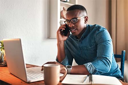man-in-a-call-with-his-laptop-open
