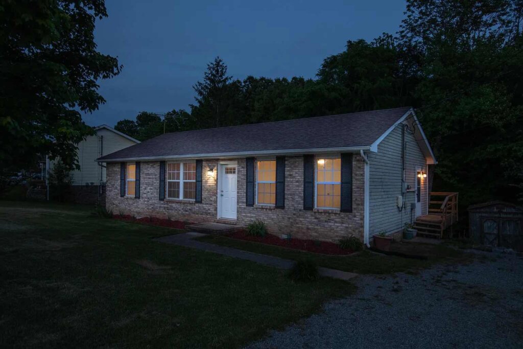 Front of a home that we bought fast with cash in Tennessee.