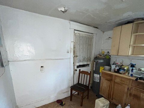 A damaged roof of a damaged house was sold on cash.