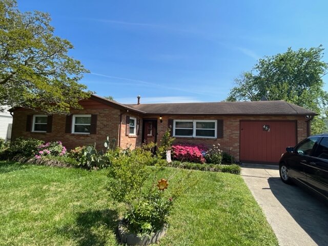 A house with a beautiful lawn and well maintained