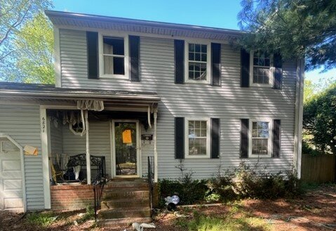 An outside view of a house for sale.