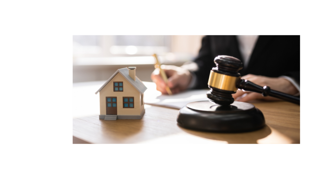 House with gavel and person writing contract 