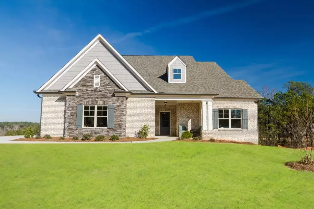 Background image of house purchased with cash