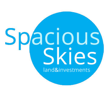 Spacious Skies Land and Investments logo