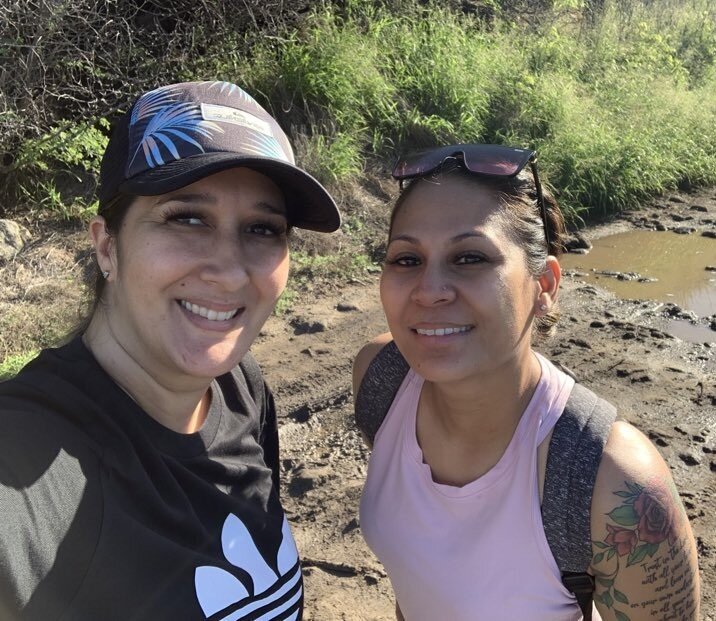 Kaiini Hamili and best friend, Liz, hiking at Kaena Point.