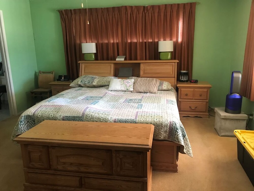 California house with outdated master bedroom.