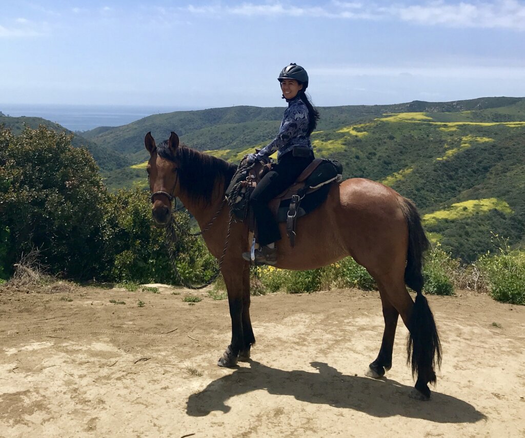 Rhonda riding her horse, Mija in California