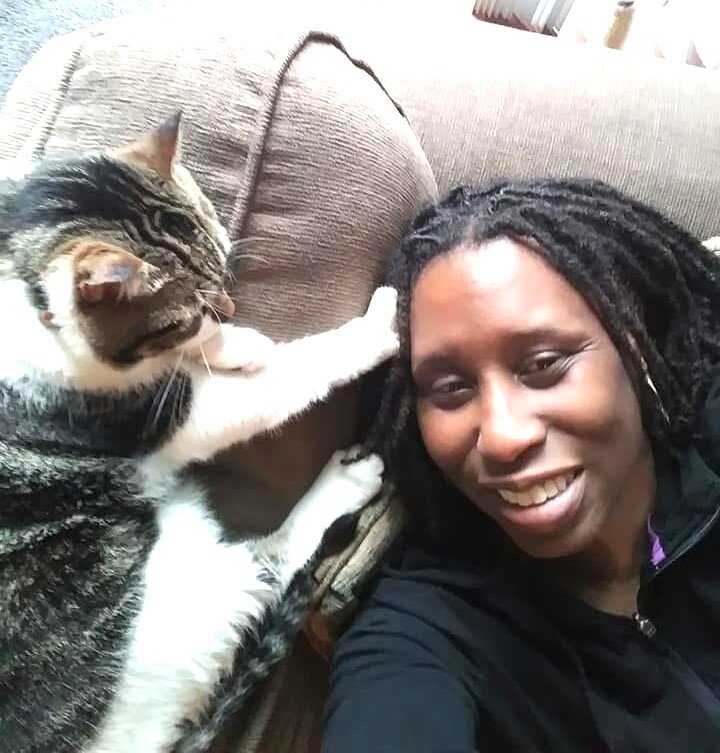 Sherry Moore with her cat, Lightning.