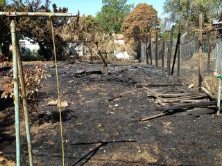 Evidence of a fire-damaged house in Stockton, California