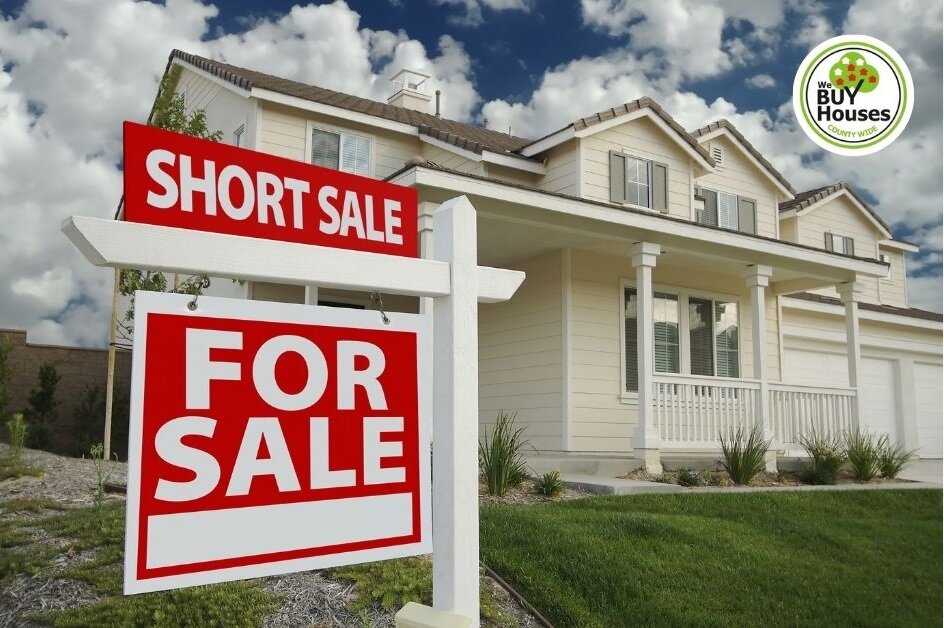 Home buyer reviewing documents before buying a short sale on house