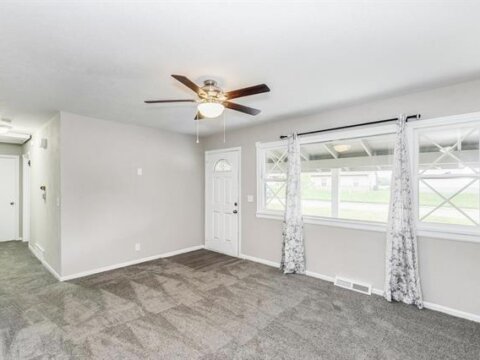 Bedroom with wide windows