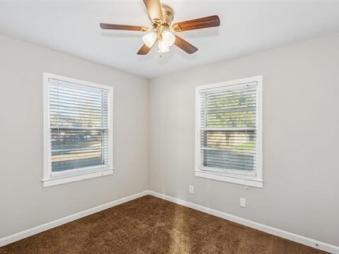 Bedroom with 2 windows