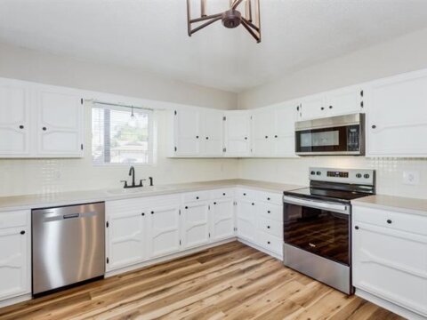 Big kitchen with built in cabinets