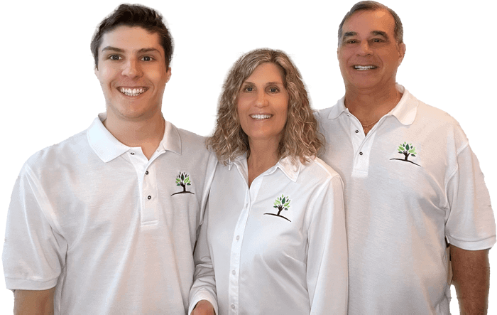 Anthony, Cynthia and Steve of Organic Home Solutions, wearing matching logo shirts.