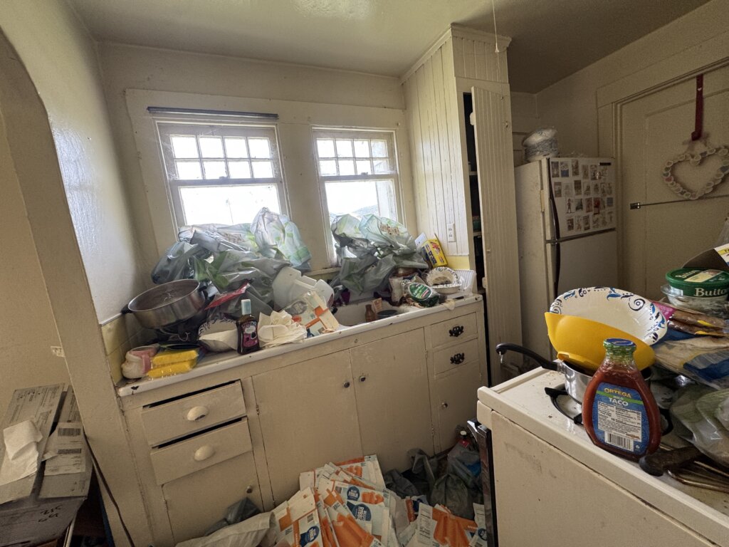 Kitchen of triplex Quick Home Offers bought.