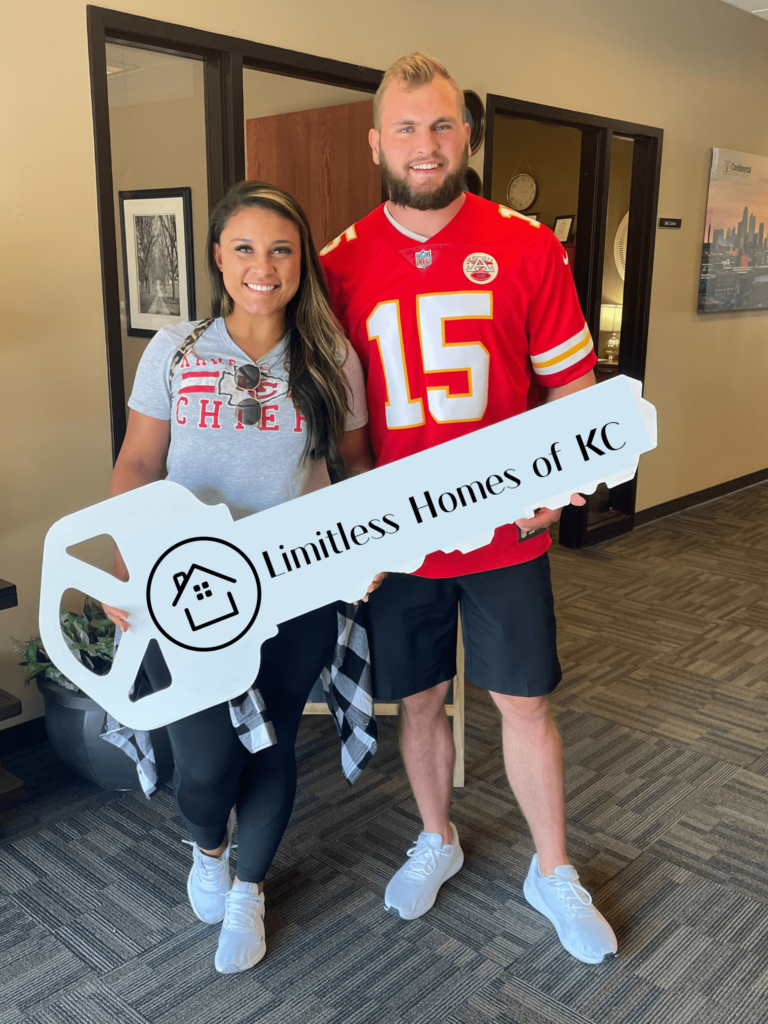 Sam and Tahsha at a successful home closing in Kansas City, helping a seller sell their property with their we buy houses services