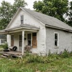 Realistic photo of a distressed home in Platte City Missouri