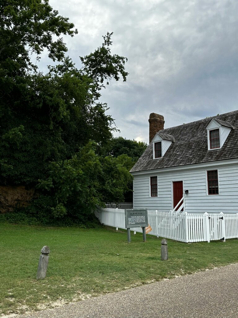 Country home with white picket fence
