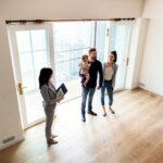 family touring a home